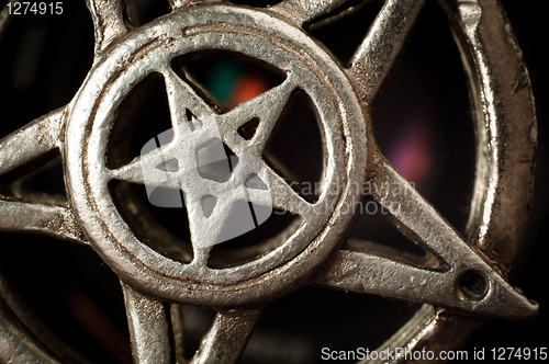 Image of Pentagram with reflection macro shot 