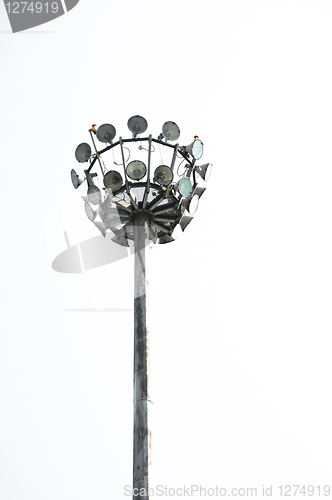 Image of Many lights on a post against isolated white backgrond