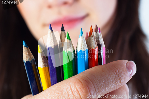 Image of Student girl with colored pencils