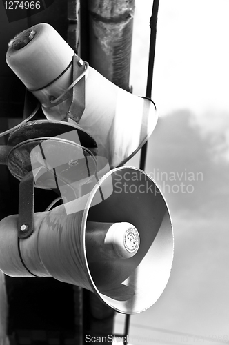 Image of Loudspeakers against blue sky