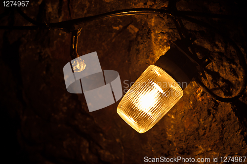 Image of Old electric light in cavern