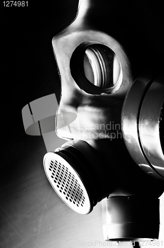 Image of Dark gasmask on enlighted background