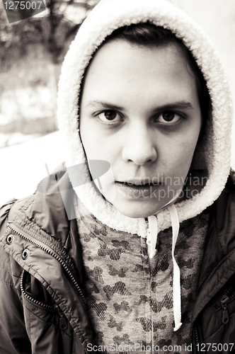 Image of Girl at outdoor looking sad