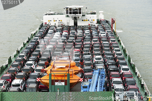 Image of Boat carries a lot of cars to market