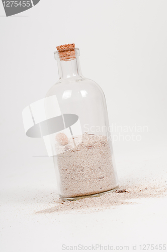 Image of Bottle with sand