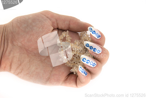 Image of A woman hand with a citrine beads