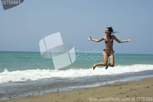 Image of Beautiful girl on a beach