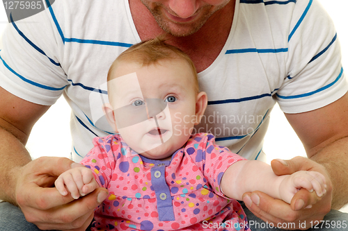 Image of Smiling father and baby