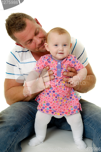 Image of Smiling father and baby