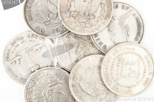 Image of old silver dollars 