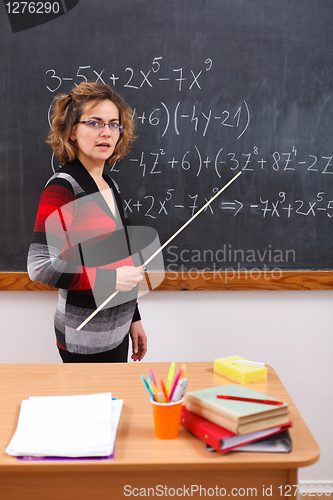 Image of Serious math teacher explaining