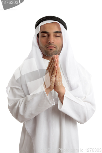 Image of Arab man praying to God