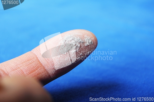 Image of dust and finger