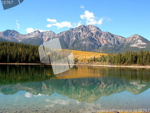 Image of Reflected mountain in still lake