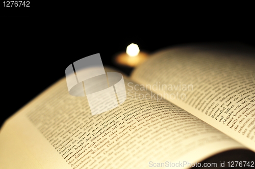 Image of book and candle