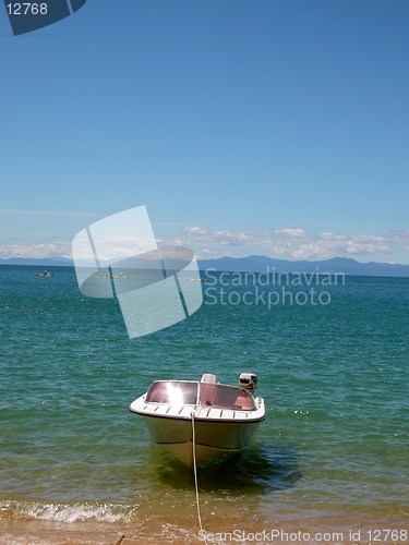 Image of Motor Boat moored on beach