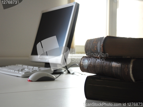 Image of books and computer