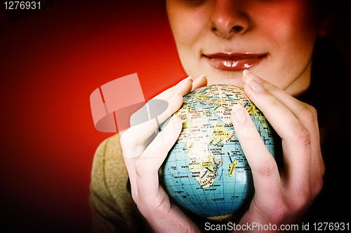 Image of Globe in a girl's hands