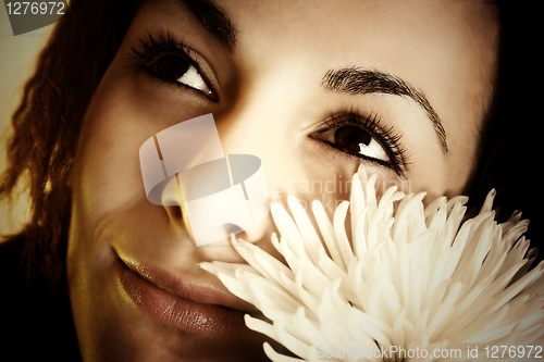 Image of Girl with a white flower