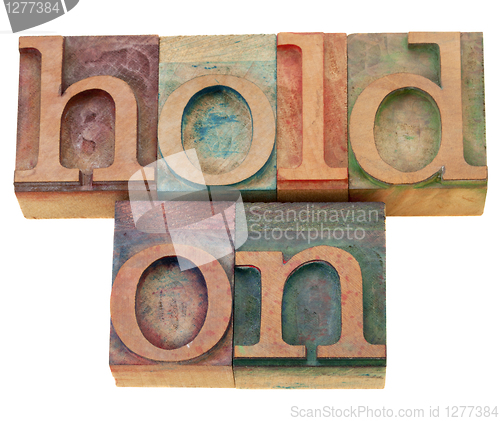Image of motivational concept - hold on