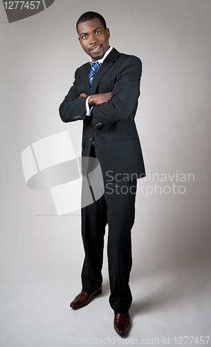 Image of African American businessman with his arms crossed