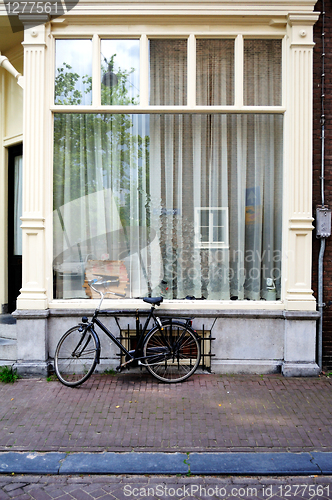 Image of Amsterdam - typical window with parked bike