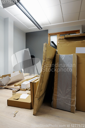 Image of Cardboard boxes in office