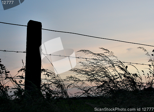 Image of rural fence at dusk