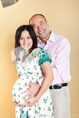 Image of Pregnant Asian woman and her husband