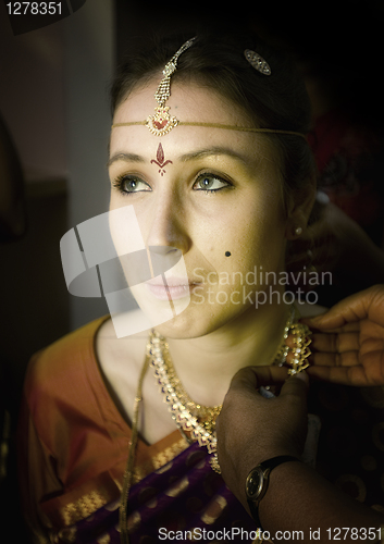 Image of Indian wedding - preparation of bride