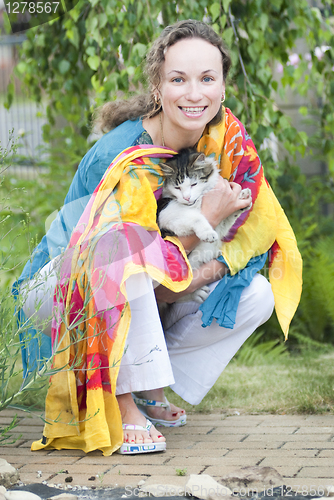 Image of attractive woman with a cat