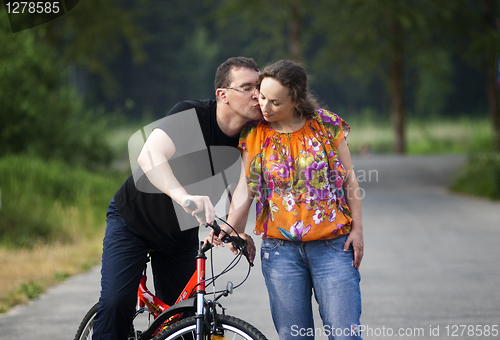 Image of Happy couple at bicycle