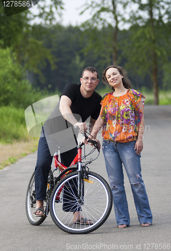 Image of Happy couple at bicycle