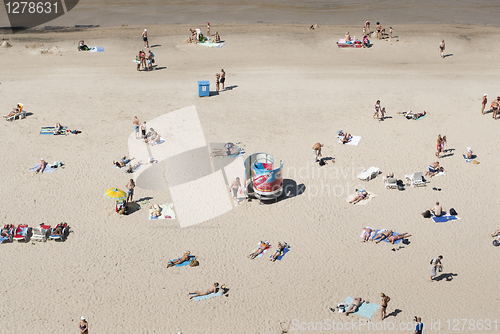 Image of People relaxing on a beach