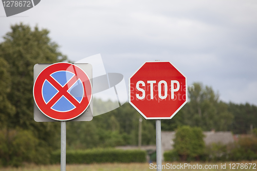 Image of Stop sign and clearway sign on roadside