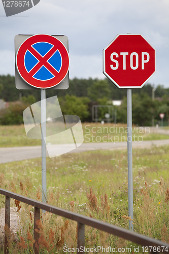 Image of Stop sign and clearway sign on roadside