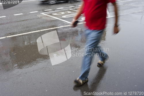 Image of Urban shopping in the rain