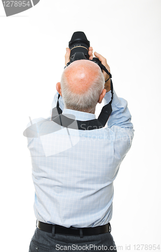 Image of man with camera back view