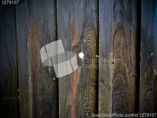 Image of Wooden fence with spyhole