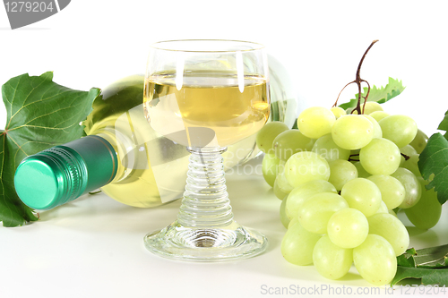 Image of white wine with glass