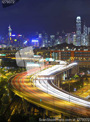 Image of modern city and highway at night