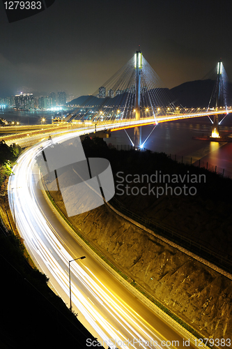 Image of highway and Ting Kau bridge at night