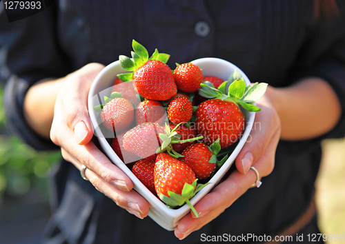 Image of strawberry in heart shape bowl