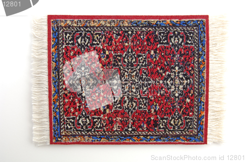 Image of Persian Rug 4, a miniature Oriental rug. (isolated, 12MP camera)