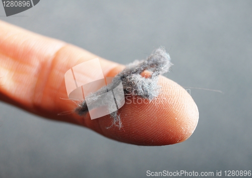 Image of dust and finger