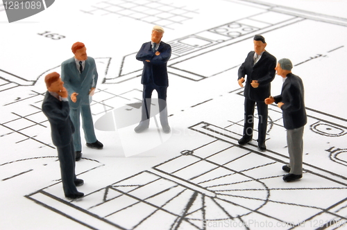 Image of meeting of businessman on architecture plan