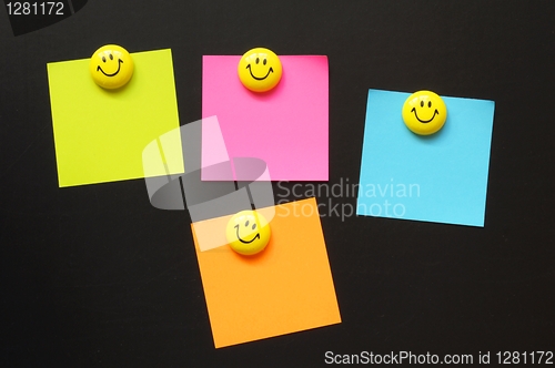 Image of smiley and paper with copyspace