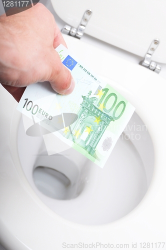 Image of money and toilet