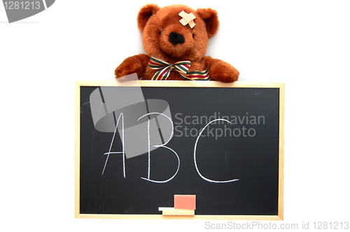 Image of teddy and blackboard