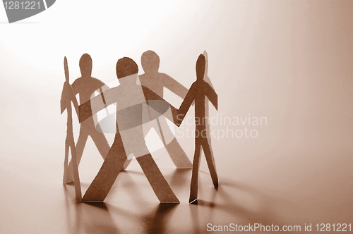 Image of teamwork of paper man